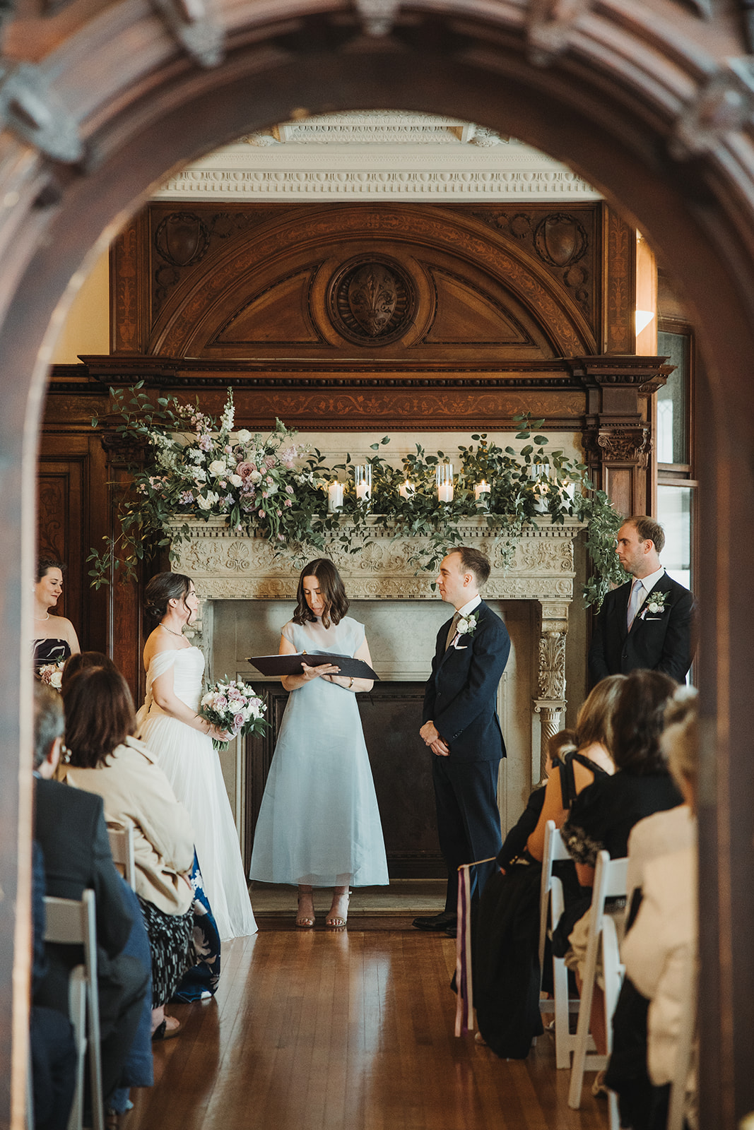 Indoor Wedding Ceremony by Fireplace at Branford House