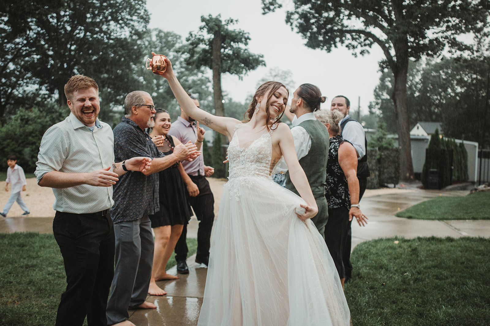 Bride Dances in Rain During CT Wedding