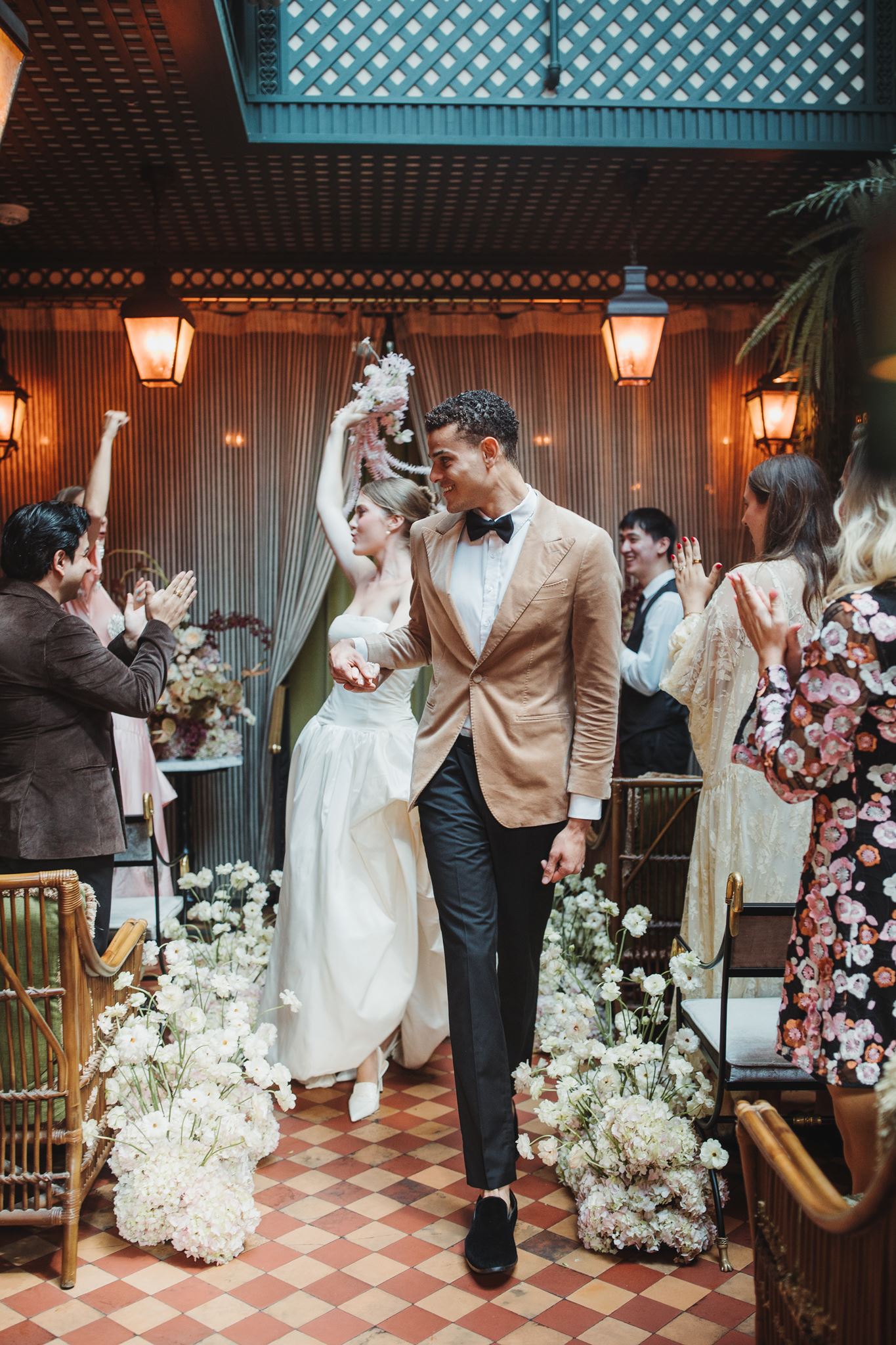 Bride and Groom Cheer, Walk Down Aisle Together After Being Pronounced Married